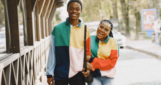 people-identifical-clothes-african-couple-autumn-city